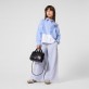Детски спортен панталон DKNY за момиче с широк крачол Детски спортен панталон DKNY за момиче с широк крачол